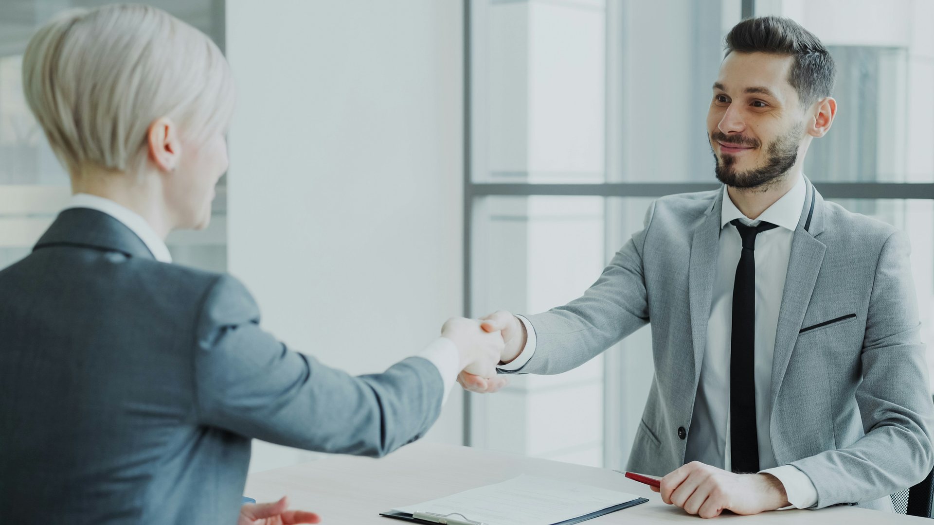 Smiling businesswoman in a bright office