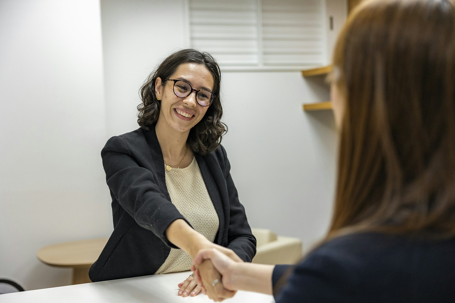 Smiling customer support advisor wearing a headset